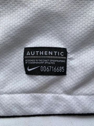 fake nike shirt|check nike authenticity.